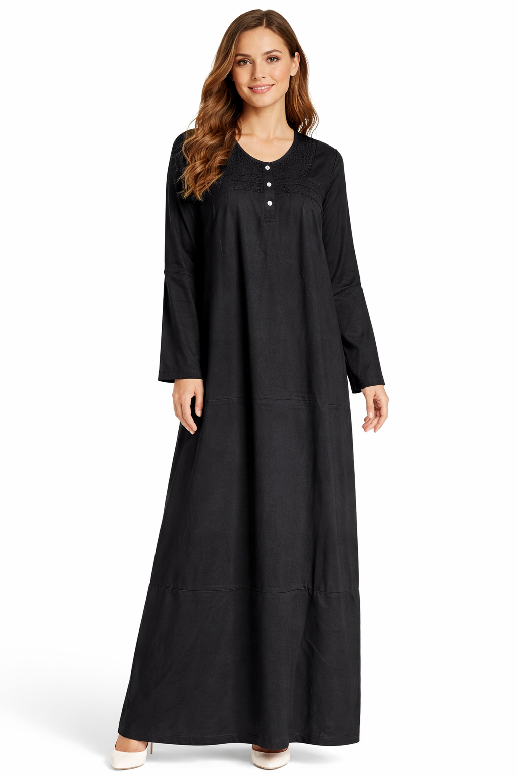 Woman wearing a black long-sleeve dress on a white background