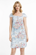 Woman wearing a floral dress on a white background