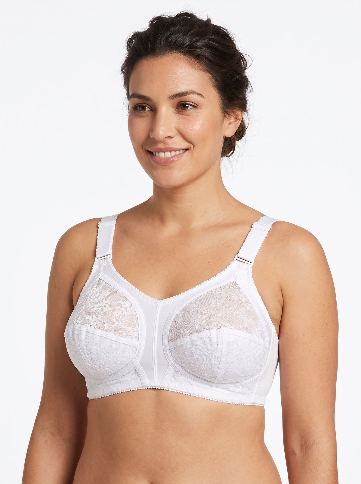 A woman wearing a white underwire bra with lace cups and adjustable shoulder straps, photographed against a clean white studio background.