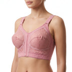 A woman wearing a pink seamless underwire bra with lace cups and adjustable shoulder straps, shown from the chest up against a plain white background.